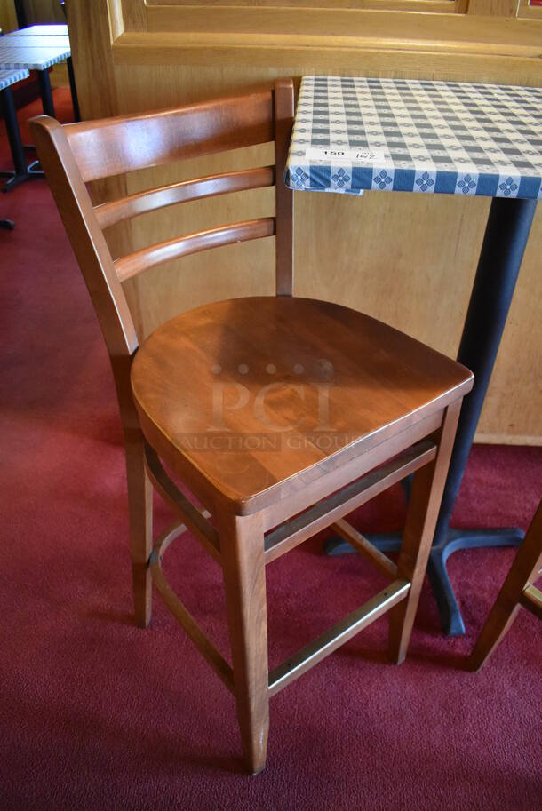 Bar Height Table w/ Table Cloth on Black Metal Table Base and 2 Wooden Bar Height Chairs. 30x24x41, 17x16x44. (Dining Room)

 - Image 2 of 5