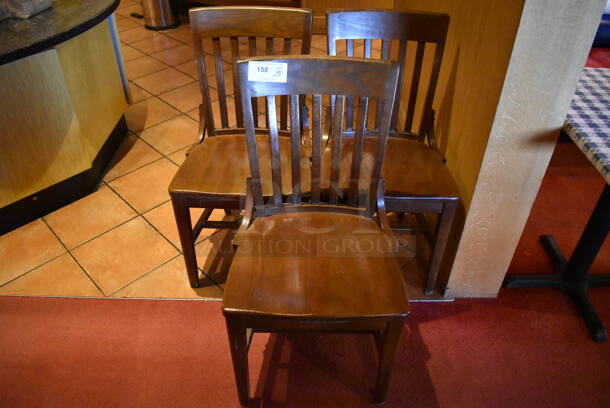 3 Wooden Dining Chairs. 3 Times Your Bid! (Dining Room)