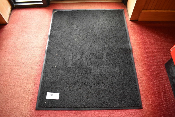 Black Floor Mat. (Dining Room)
