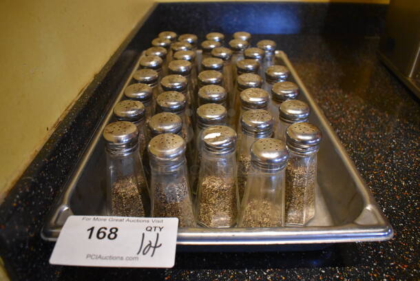ALL ONE MONEY! Lot of Salt/Pepper Shakers in Full Size Stainless Steel Drop In Bin. (Dining Room) - Image 1 of 3