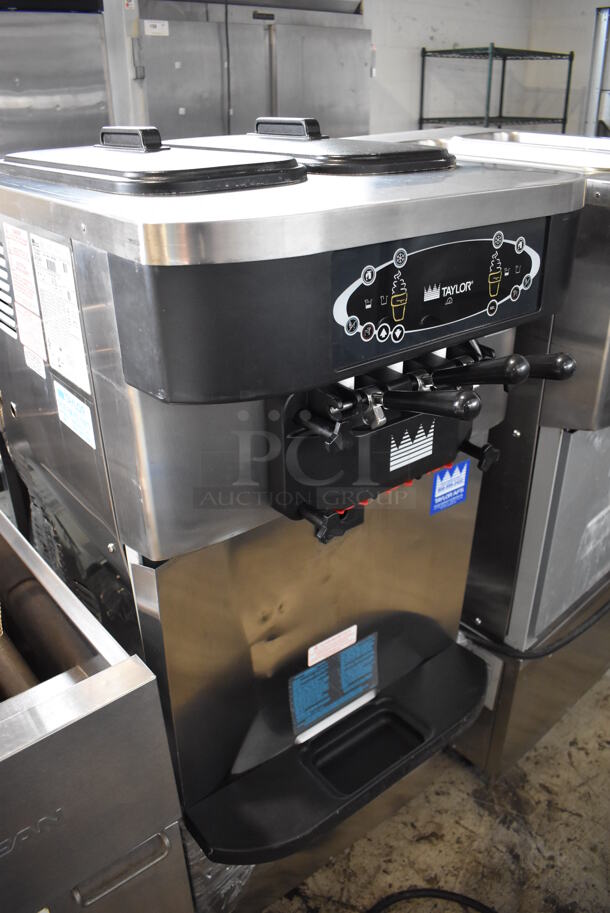 2012 Taylor C723-33 Stainless Steel Commercial Floor Style Water Cooled 2 Flavor Soft Serve Ice Cream Machine on Commercial Casters. 208-230 Volts, 3 Phase. 23x35x56