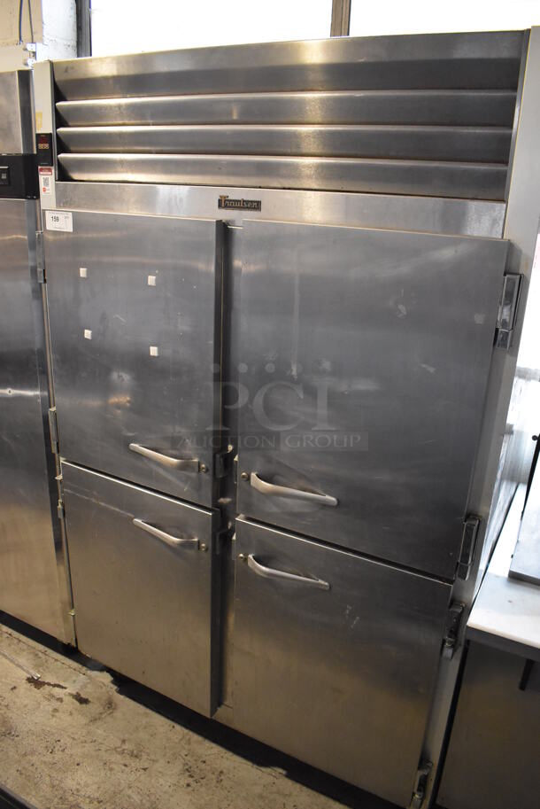 Traulsen G200000 ENERGY STAR Stainless Steel Commercial 4 Half Size Door Reach In Cooler on Commercial Casters. 115 Volts, 1 Phase. 52x36x83. Tested and Powers On But Does Not Get Cold - Image 1 of 8
