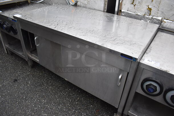 Stainless Steel Table w/ 2 Doors and Under Shelf. 54.5x30x32.5