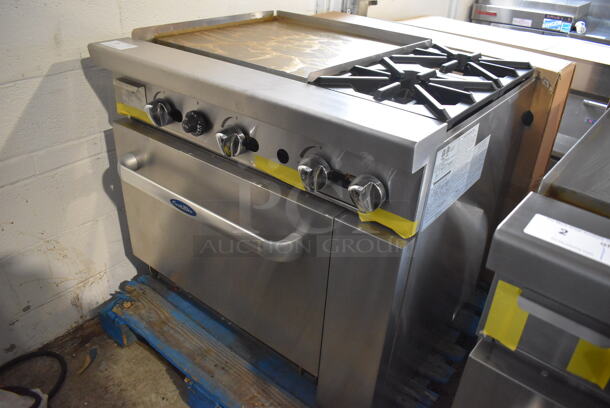 BRAND NEW! Cook Rite ATO-24G2B Stainless Steel Commercial Natural Gas Powered Flat Top Griddle w/ 2 Burner Range, Oven, Back Splash and Over Shelf. Stock Picture Used For Gallery Picture. 36x31x31 - Image 5 of 10