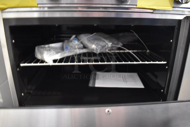 BRAND NEW! Cook Rite ATO-24G2B Stainless Steel Commercial Natural Gas Powered Flat Top Griddle w/ 2 Burner Range, Oven, Back Splash and Over Shelf. Stock Picture Used For Gallery Picture. 36x31x31 - Image 8 of 10
