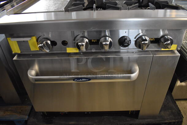 BRAND NEW! Cook Rite ATO-24G2B Stainless Steel Commercial Natural Gas Powered Flat Top Griddle w/ 4 Burner Range, Oven, Back Splash and Over Shelf. Stock Picture Used For Gallery Picture. 36x31x31 - Image 7 of 11