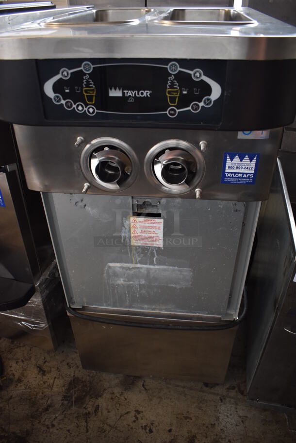 2012 Taylor C723-33 Stainless Steel Commercial Floor Style Water Cooled 2 Flavor Soft Serve Ice Cream Machine on Commercial Casters. Missing Parts. 208-230 Volts, 3 Phase. 23x35x56 - Image 2 of 9