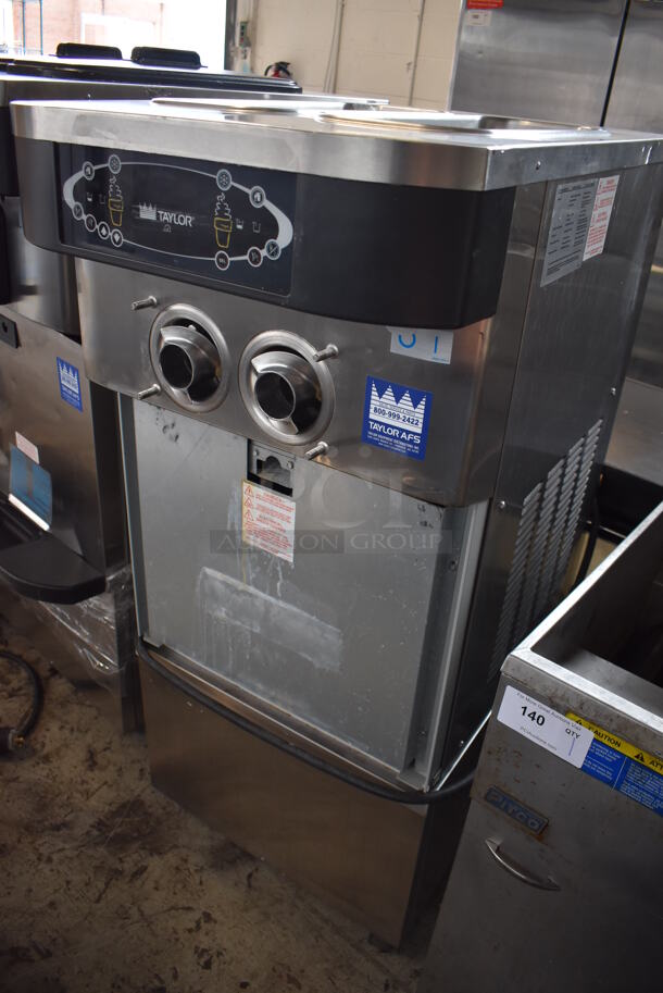 2012 Taylor C723-33 Stainless Steel Commercial Floor Style Water Cooled 2 Flavor Soft Serve Ice Cream Machine on Commercial Casters. Missing Parts. 208-230 Volts, 3 Phase. 23x35x56