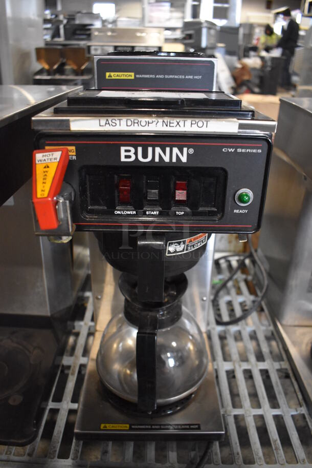2012 Bunn CWTF15 Stainless Steel Commercial 2 Burner Coffee Machine w/ Hot Water Dispenser, Poly Brew Basket and Coffee Pot. 120 Volts, 1 Phase. 8x21x20
