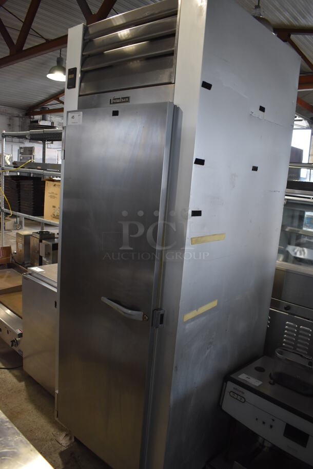 Traulsen G10011 Stainless Steel Commercial Single Door Reach In Cooler w/ Poly Coated Racks on Commercial Casters. 115 Volts, 1 Phase. 30x34x83. Tested and Working!