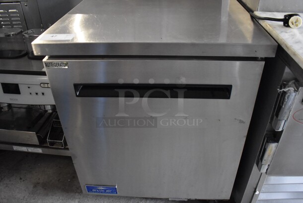 Arctic Air AUC27R Stainless Steel Commercial Single Door Undercounter Cooler on Commercial Casters. 115 Volts, 1 Phase. 28x30x36. Tested and Powers On But Does Not Get Cold