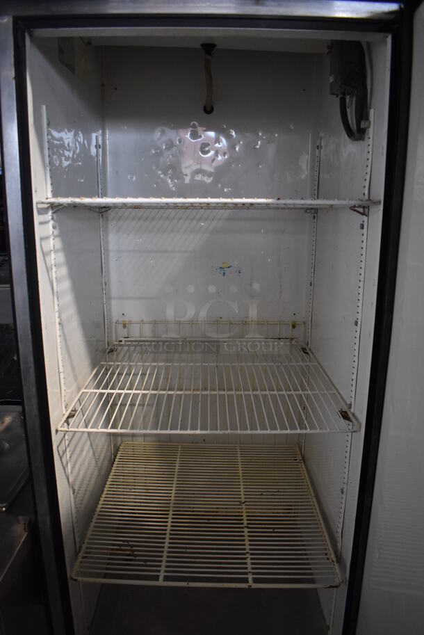 True T-23F Stainless Steel Commercial Single Door Reach In Freezer w/ Poly Coated Racks on Commercial Casters. 115 Volts, 1 Phase. 27x30x83. Tested and Powers On But Does Not Get Cold - Image 5 of 7