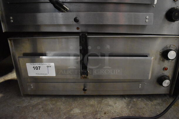 J&J Snack Foods JJ560E Stainless Steel Commercial Countertop Electric Powered Pizza Oven / Snack Oven. 120 Volts, 1 Phase. 23.5x20x10.5. Tested and Working! - Image 1 of 4