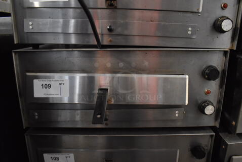 J&J Snack Foods JJ560E Stainless Steel Commercial Countertop Electric Powered Pizza Oven / Snack Oven. 120 Volts, 1 Phase. 23.5x20x10.5. Tested and Working!