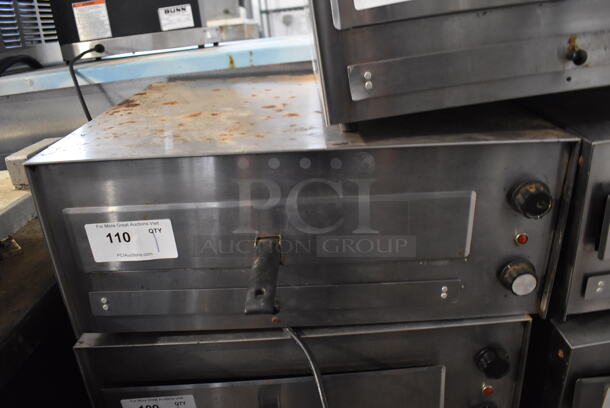 J&J Snack Foods JJ560E Stainless Steel Commercial Countertop Electric Powered Pizza Oven / Snack Oven. 120 Volts, 1 Phase. 23.5x20x10.5. Tested and Working! - Image 1 of 4