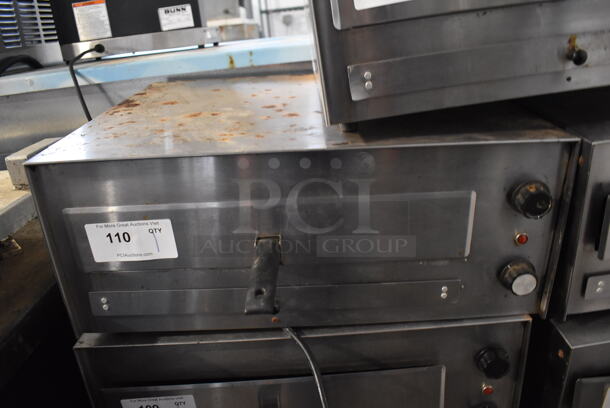 J&J Snack Foods JJ560E Stainless Steel Commercial Countertop Electric Powered Pizza Oven / Snack Oven. 120 Volts, 1 Phase. 23.5x20x10.5. Tested and Working!