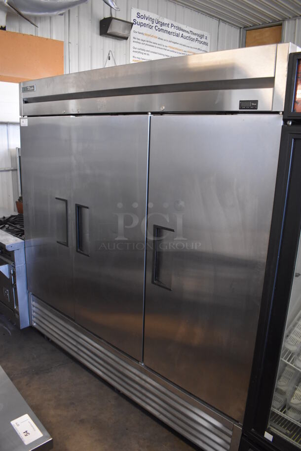 2017 True T-72F-HC Stainless Steel Commercial 3 Door Reach In Freezer w/ Poly Coated Racks on Commercial Casters. 115 Volts, 1 Phase. Tested and Working!