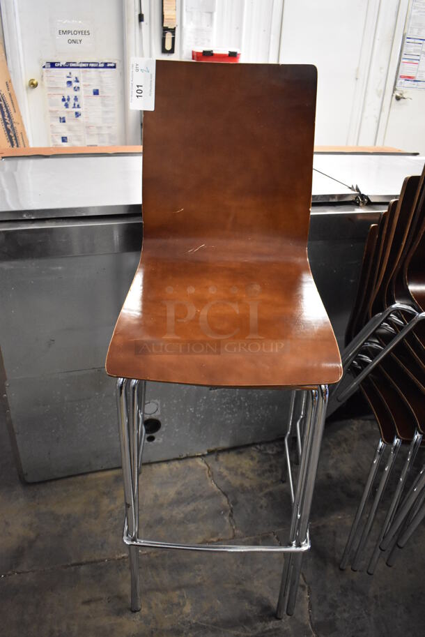 2 Dark Wood Pattern Bar Height Chairs on Chrome Finish Frame. Stock Picture - Cosmetic Condition May Vary. 2 Times Your Bid!