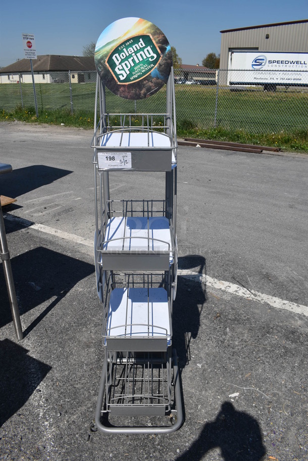 Gray Metal 4 Tier Rack on Commercial Casters.