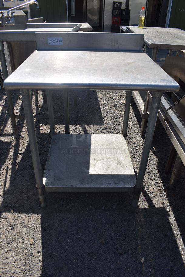 Stainless Steel Commercial Table w/ Under Shelf and Back Splash. 