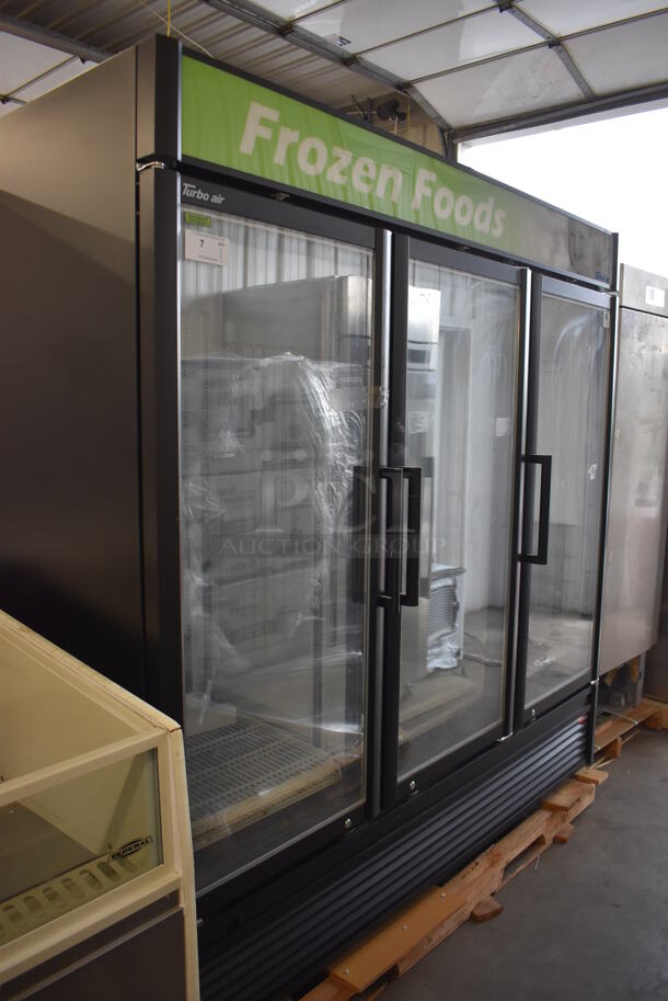LIKE NEW! Turbo Air TGF-72SDB-N Metal Commercial 3 Door Reach In Freezer Merchandiser w/ Poly Coated Racks. 110-120 Volts, 1 Phase. Unit Has Only Been Used a Few Times! Tested and Working!