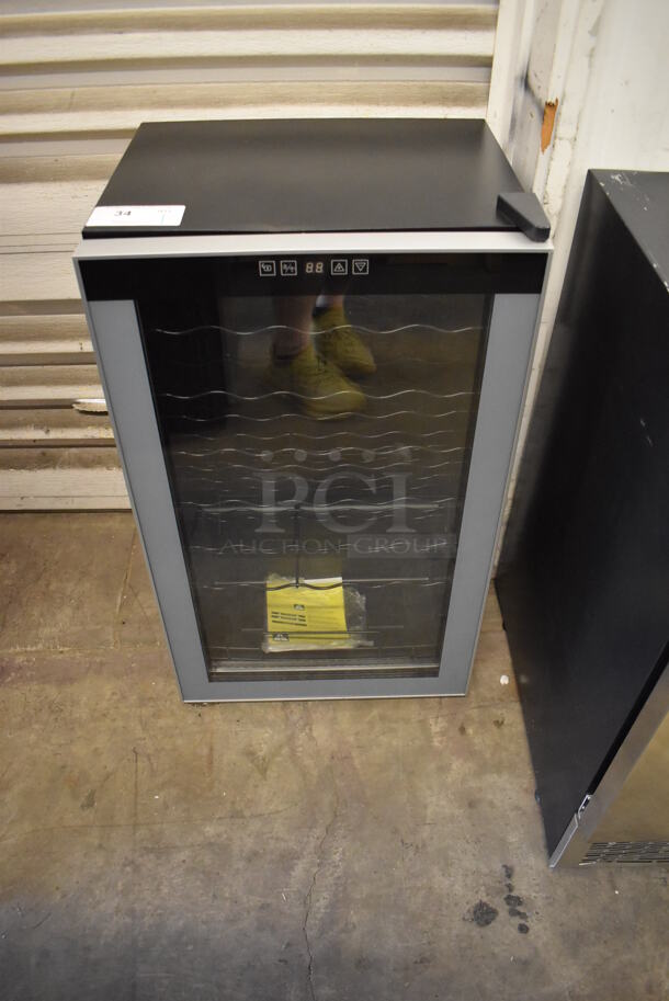 BRAND NEW SCRATCH AND DENT! Avanti WC34N2P Metal Commercial Mini Wine Chiller Merchandiser. 115 Volts, 1 Phase. Tested and Working!