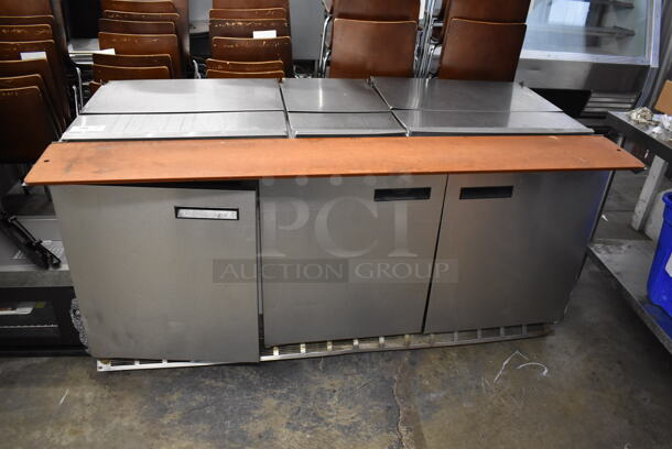 2013 Delfield Model 4472N-30M-M479 Stainless Steel Commercial Prep Table w/ Cutting Board on Commercial Casters. 115 Volts, 1 Phase. Tested and Working!