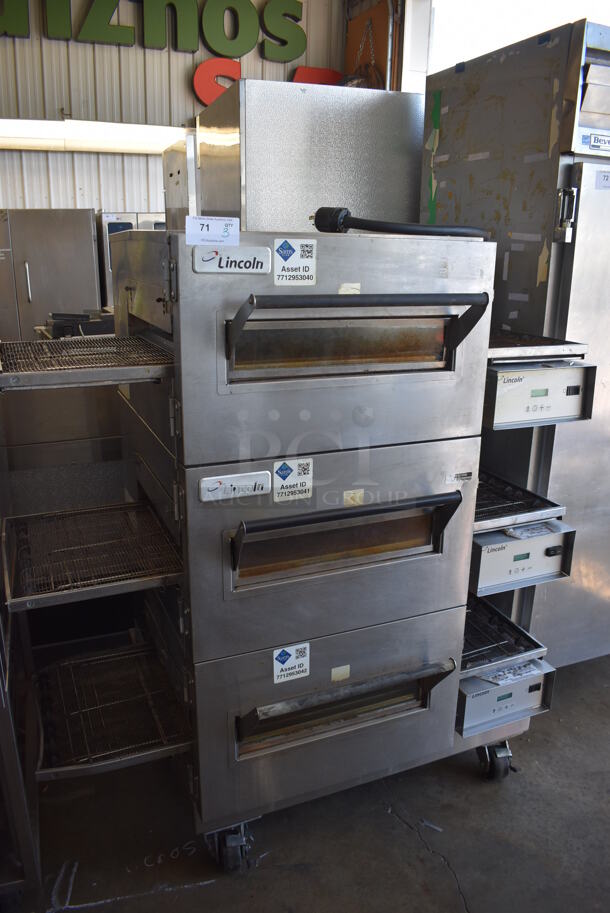 3 2013 Lincoln Impinger 1132 Stainless Steel Commercial Electric Powered Conveyor Pizza Oven on Commercial Casters. 208/240 Volts, 3 Phase. 3 Times Your Bid!