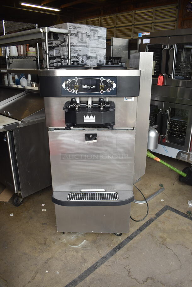 2012 Taylor C722N-27 Commercial Stainless Steel Electric Powered Air Cooling Soft Serve Ice Cream Machine With Bin Of Parts And Manual. 208-230V/1 Phase. 