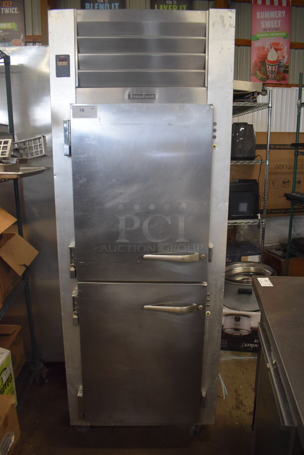 Traulsen Commercial Stainless Steel One Section Freezer With Two Solid Doors And Steel Racks on Commercial Casters. 115 Volt 1 Phase.  Tested and Working!