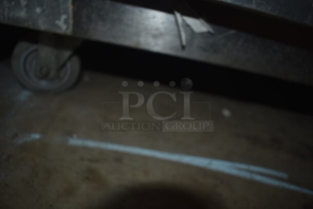 Traulsen Commercial Stainless Steel One Section Freezer With Two Solid Doors And Steel Racks on Commercial Casters. 115 Volt 1 Phase.  Tested and Working! - Image 6 of 6