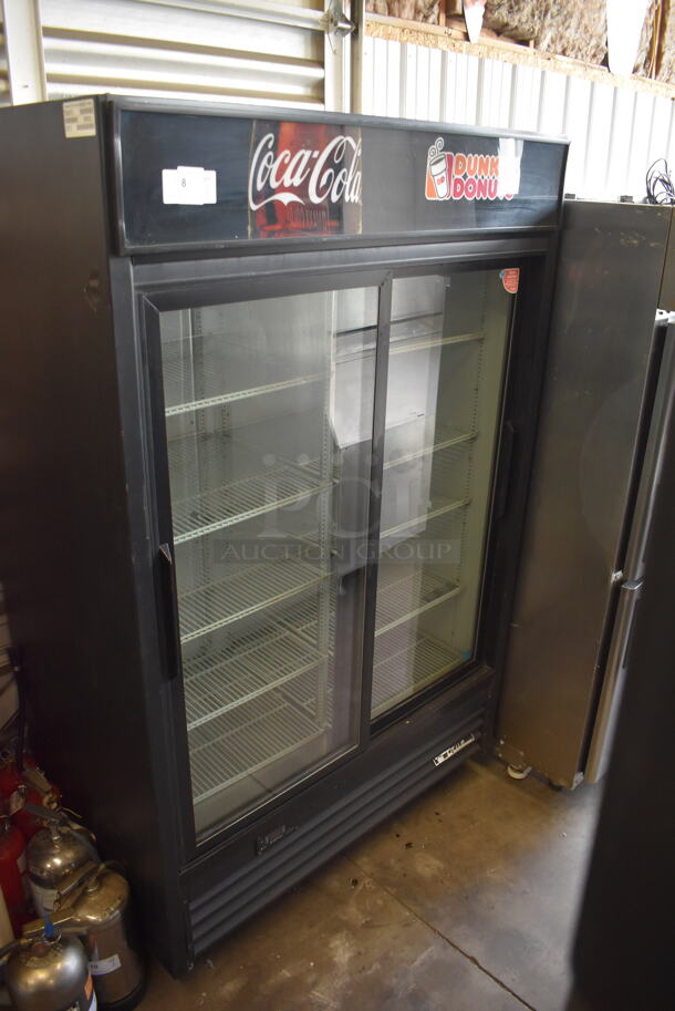 2012 True GDM-45EM-LD Commercial Two Sliding Door Black Reach-In Merchandiser Cooler  With Polycoated Racks. 115V/1 Phase. Tested and Working!