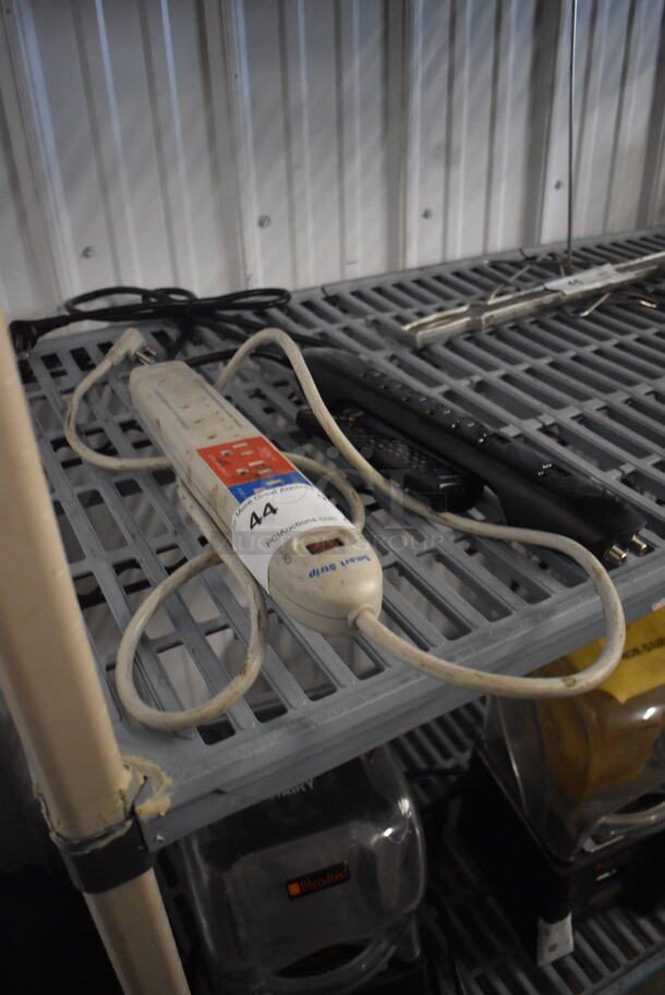 ALL ONE MONEY! Lot of 2 Outlet Power Strips and 1 Black Remote.  - Image 2 of 2