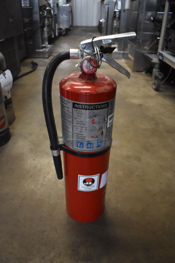 JL Fire Extinguisher, Red. Buyer Must Pick Up-We Will Not Ship This Item.  - Image 1 of 3