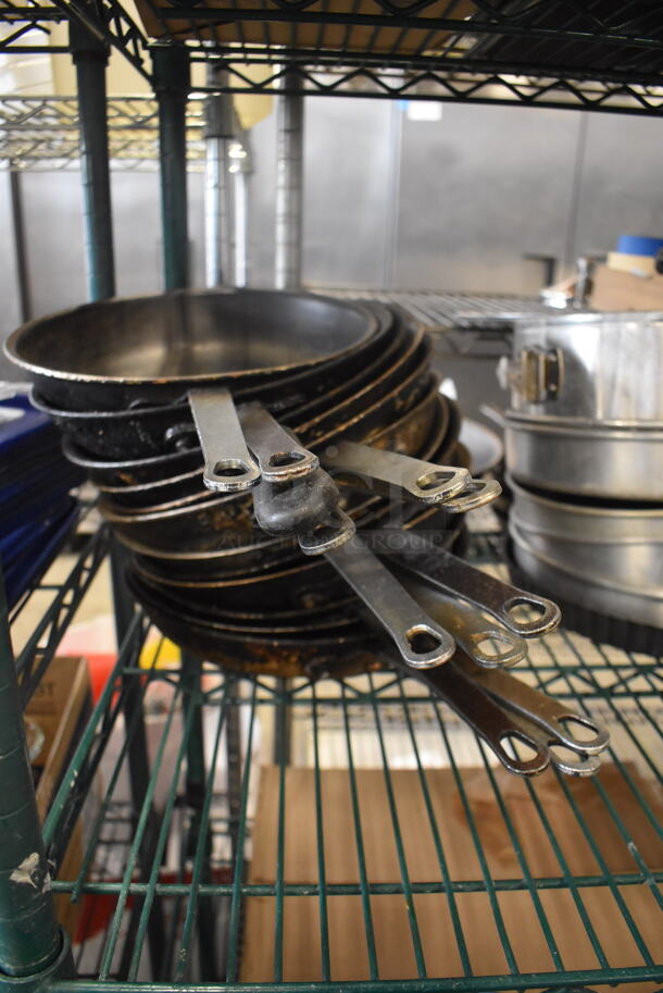 12 Cast Iron Pans With Steel Handles. 12 Times Your Bid!  - Image 1 of 2