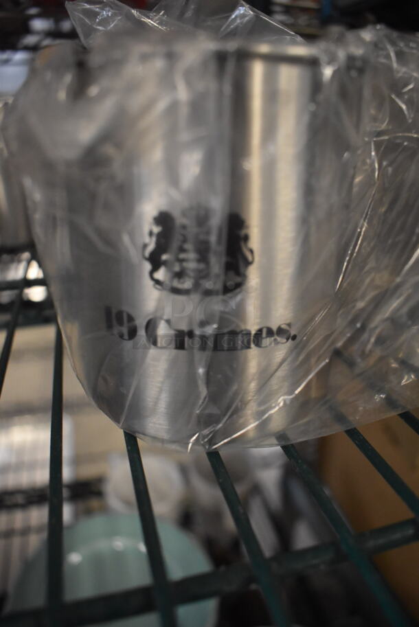 ALL ONE MONEY! Lot of 12 Items Including One Stainless Steel Carafe Server With Black Top and Handle And Stainless Steel Cups With Handles.  - Image 3 of 3