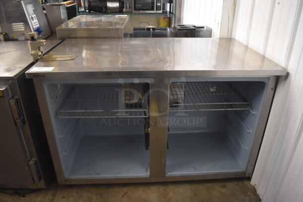 Delfield Undercounter Cooler With Metal Shelves. Missing Doors. 115 Volts 1 Phase Tested and Powers On But Does Not Get Cold - Image 1 of 4