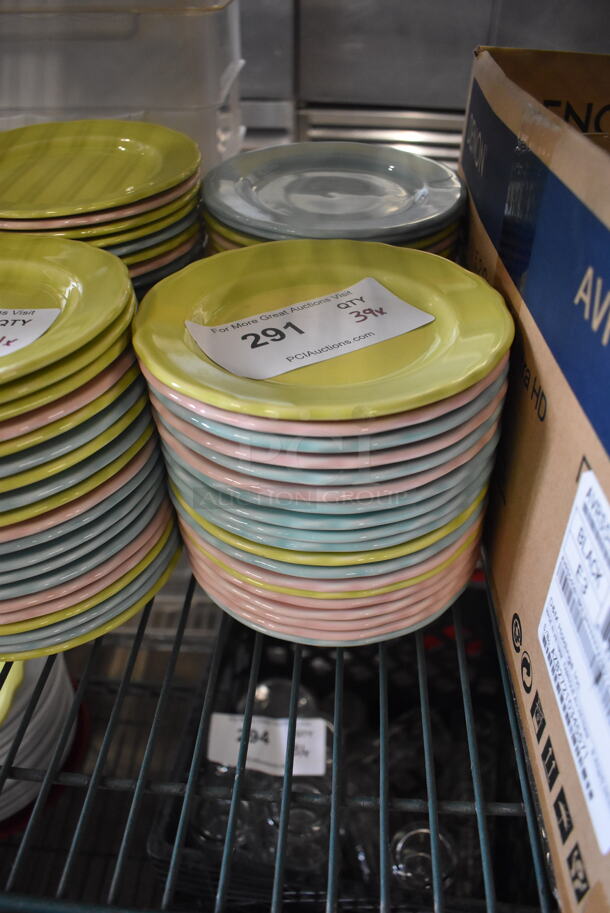 39 Homer Laughlin Pastel Plates In Yellow, Pink and Blue. 39 Times Your Bid!  - Image 1 of 3