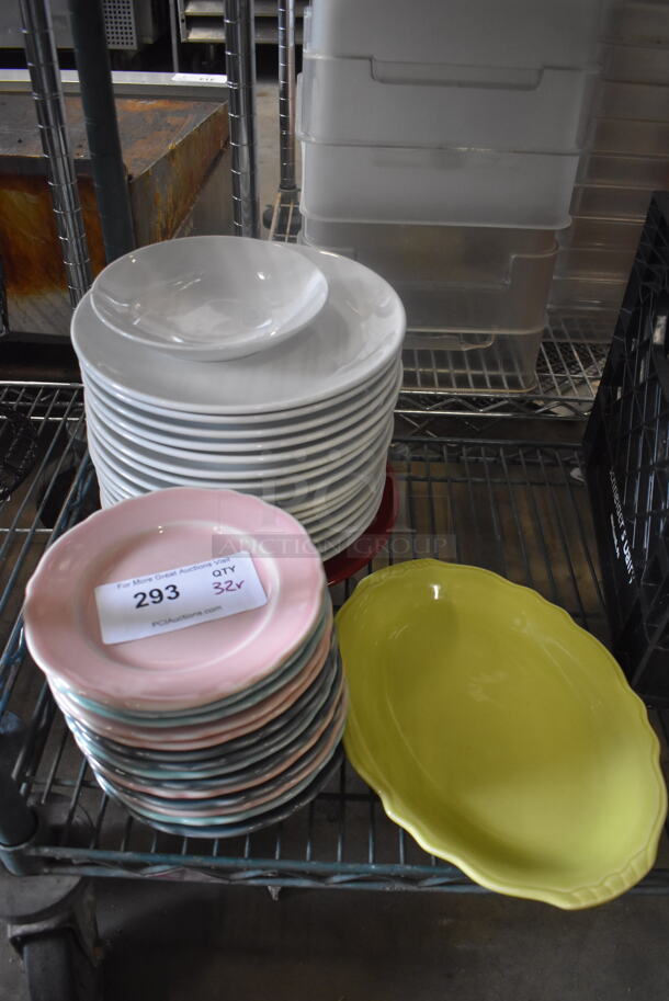 32 Homer Laughlin Pastel Dishes Including Pink, Blue and Gray Dishes, 1 Yellow Platter and White Plates. 32 Times Your Bid! 