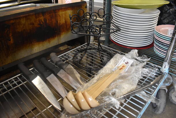 ALL ONE MONEY! Lot of 9 Items Including Plastic Ladles, Steel Serrated Knives With Black Handles, Metal Tongs And a Decorative Black Stand.  - Image 2 of 2