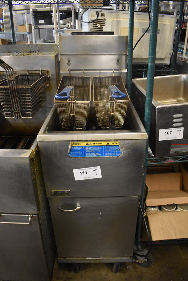 Pitco 35C+ Commercial Stainless Steel Natural Gas Fryer With 2 Fry Baskets On Commercial Casters.