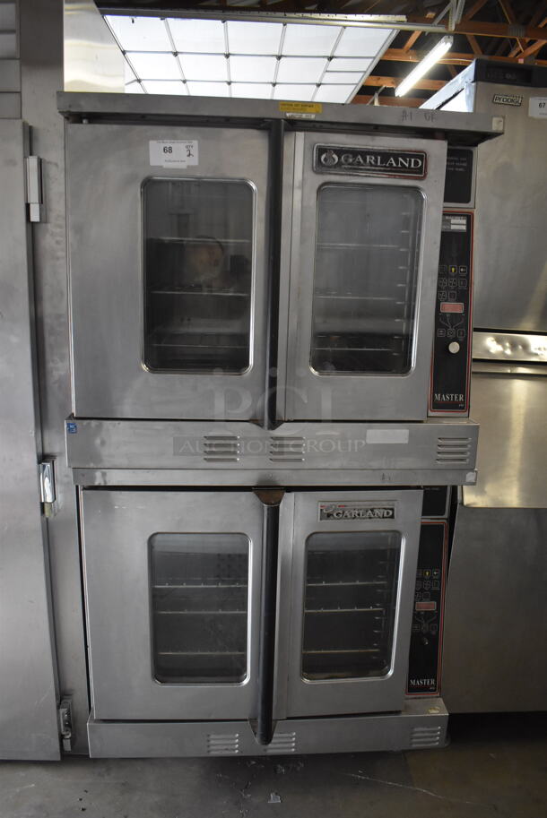 2 Garland Master 450 Commercial Stainless Steel Double Stack Natural Gas Powered 2 Door Convection Ovens With Steel Racks on Commercial Casters. 2 Times Your Bid! 