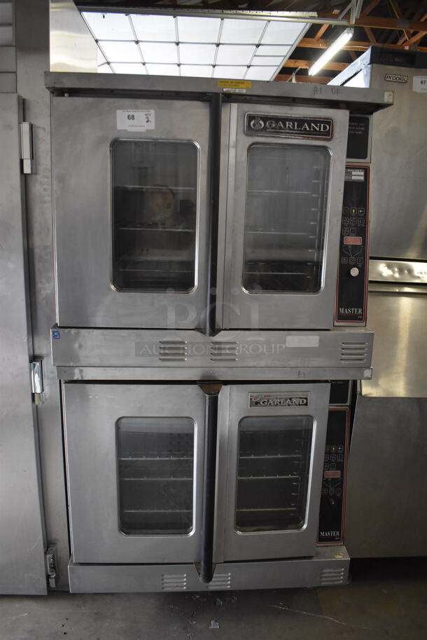 2 Garland Master 450 Commercial Stainless Steel Double Stack Natural Gas Powered 2 Door Convection Ovens With Steel Racks on Commercial Casters. 2 Times Your Bid!  - Image 1 of 6