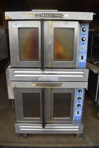 2 Bakers Pride Commercial Stainless Steel Natural Gas Powered Double Stack 2 Glass Door Convection Ovens With Steel Racks on Commercial Casters. 2 Times You Bid! 