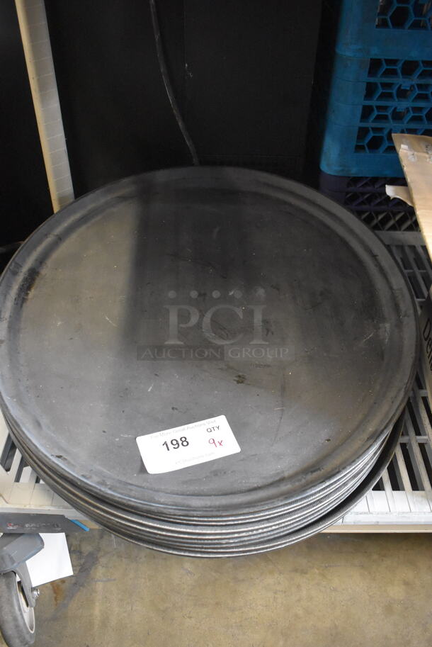 9 Round Steel Serving Trays. 9 Times Your Bid! 