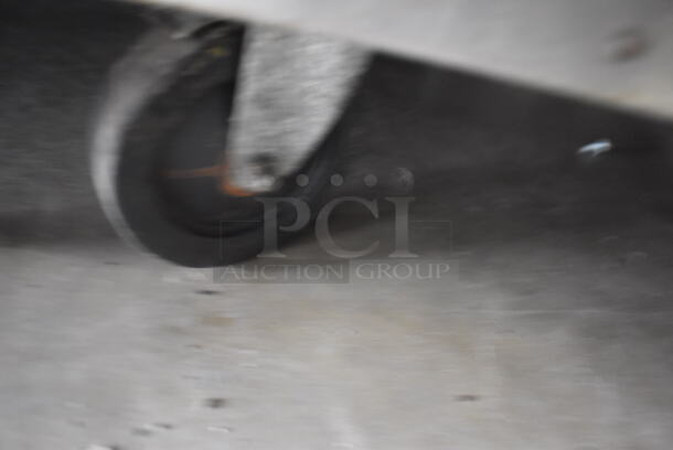 Magikitch'n Magi Glow Broiler Model FMSMB 30 Commercial Stainless Steel Natural Gas Powered Radiant Charbroiler Including 2 Brushes On Commercial Casters.   - Image 7 of 8