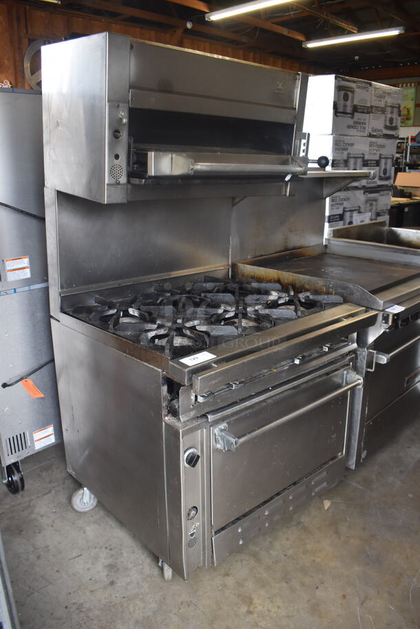 Jade Range Commercial Stainless Steel Natural Gas Powered Oven With 6 Gas Burners And Salamander Broiler and Salamander Shelves On Commercial Casters.  - Image 2 of 9