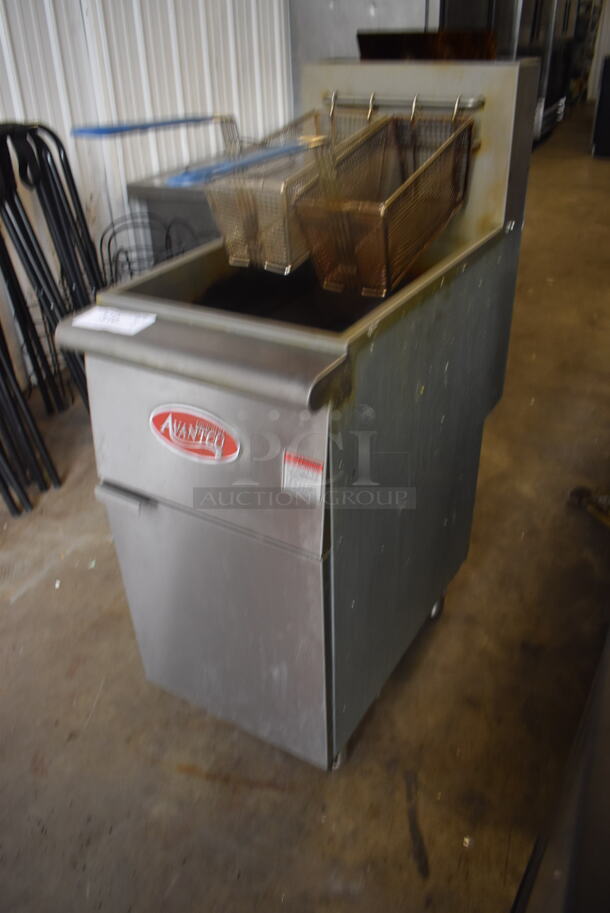 Avantco FF300-N Commercial Stainless Steel Natural Gas Fryer With Two Frying Baskets On Galvanized Legs. 90,000 BTU.  - Image 3 of 7