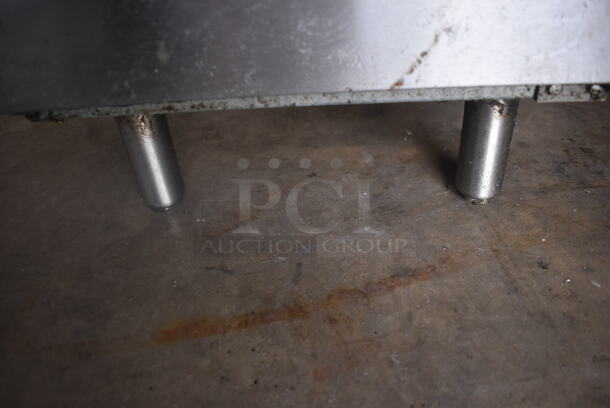 Avantco FF300-N Commercial Stainless Steel Natural Gas Fryer With Two Frying Baskets On Galvanized Legs. 90,000 BTU.  - Image 7 of 7