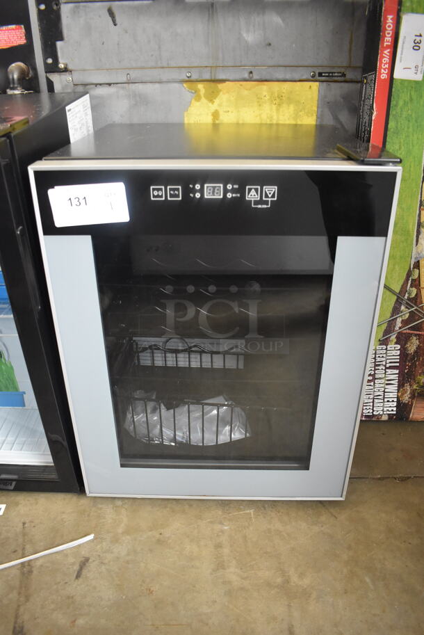 Avanti Electric Powered Beverage Cooler With Glass Door Trimmed in Stainless Steel And Polycoated Shelves. 115 Volts 1 Phase Tested and Working!